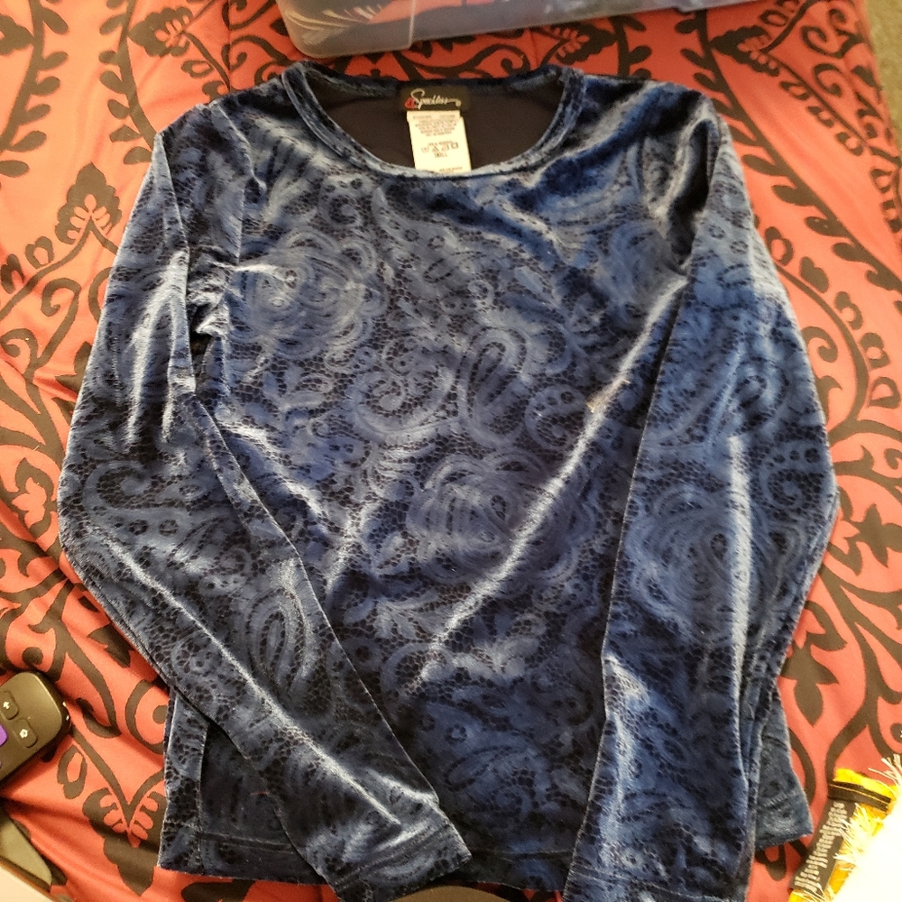 Girls blue long sleeve top.